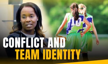 Softball player conflict and team identity