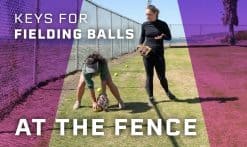 fielding balls at the fence